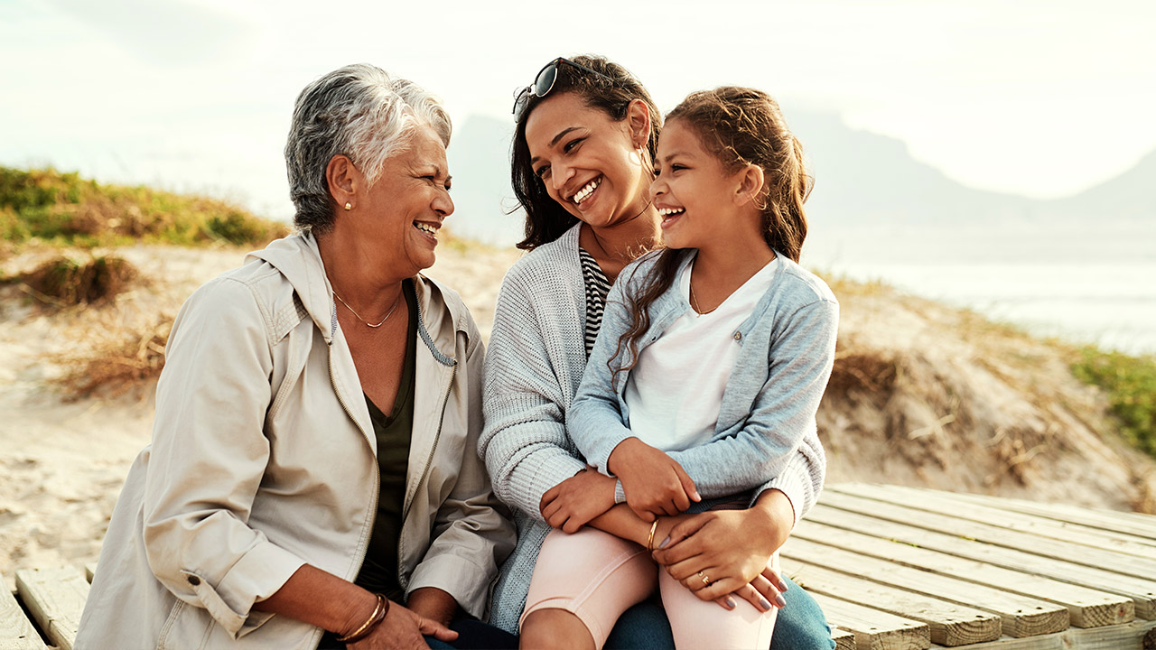 Little girl having great time with her mother and grandma
